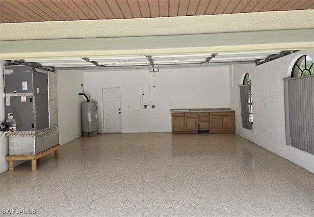 7311 Sean Ln, North Fort Myers, FL 33917 - garage with gas water heater, heating unit, and electric panel