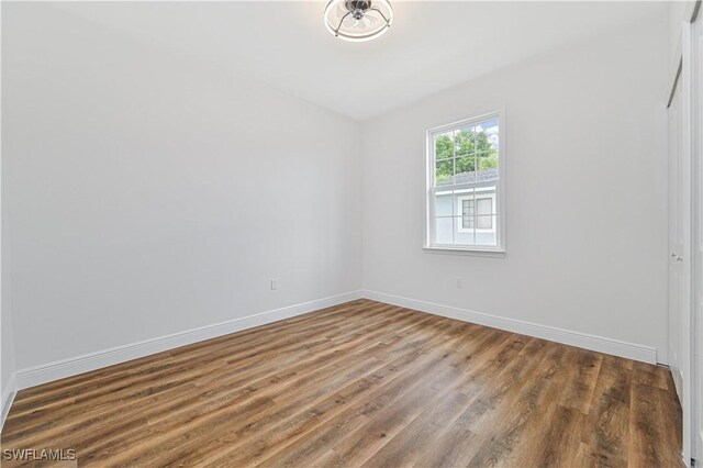 2174 Highland Ave, Fort Myers, FL 33916 - spare room featuring wood finished floors and baseboards