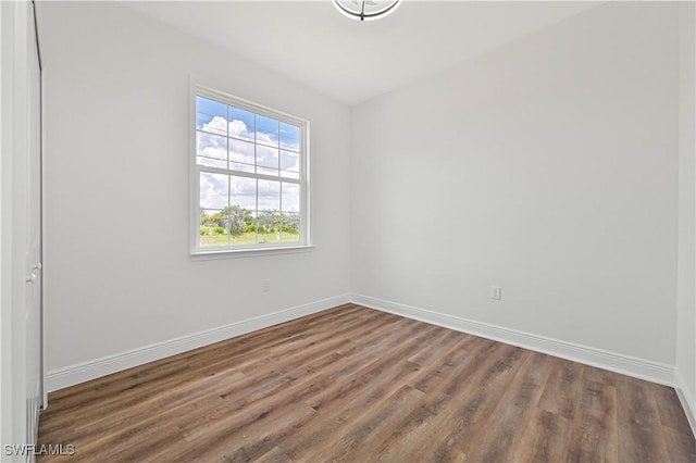 2174 Highland Ave, Fort Myers, FL 33916 - spare room with baseboards and wood finished floors