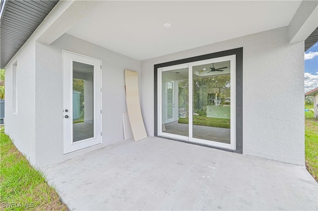 2174 Highland Ave, Fort Myers, FL 33916 - property entrance featuring stucco siding and a patio area