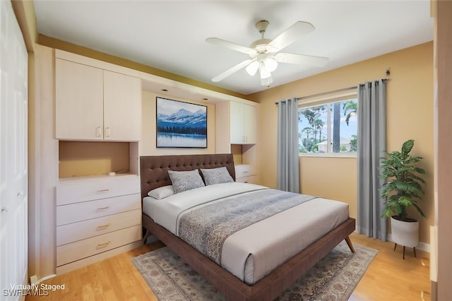 6731 Blake Pledger Ct, North Fort Myers, FL 33917 - bedroom featuring light wood-style floors and ceiling fan