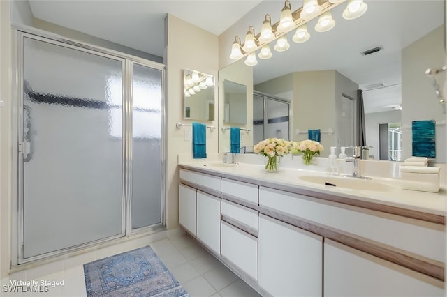 6731 Blake Pledger Ct, North Fort Myers, FL 33917 - full bath with a sink, a wealth of natural light, a stall shower, and visible vents