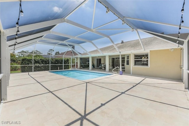6731 Blake Pledger Ct, North Fort Myers, FL 33917 - pool with a patio and glass enclosure