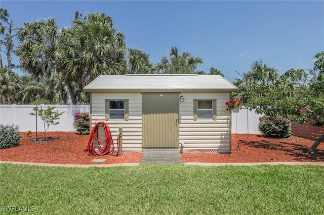 6731 Blake Pledger Ct, North Fort Myers, FL 33917 - view of shed featuring fence