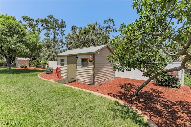 6731 Blake Pledger Ct, North Fort Myers, FL 33917 - view of shed featuring fence