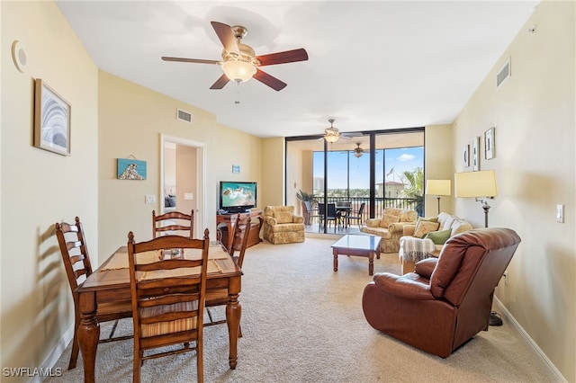 5781 Cape Harbour Dr Unit 610, Cape Coral, FL 33914 - dining space featuring ceiling fan, carpet flooring, visible vents, and floor to ceiling windows