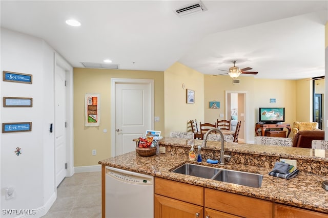 5781 Cape Harbour Dr Unit 610, Cape Coral, FL 33914 - kitchen featuring white dishwasher, light stone countertops, baseboards, ceiling fan, and a sink
