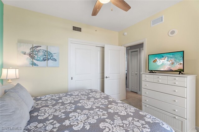 5781 Cape Harbour Dr Unit 610, Cape Coral, FL 33914 - bedroom featuring ceiling fan, a closet, and visible vents