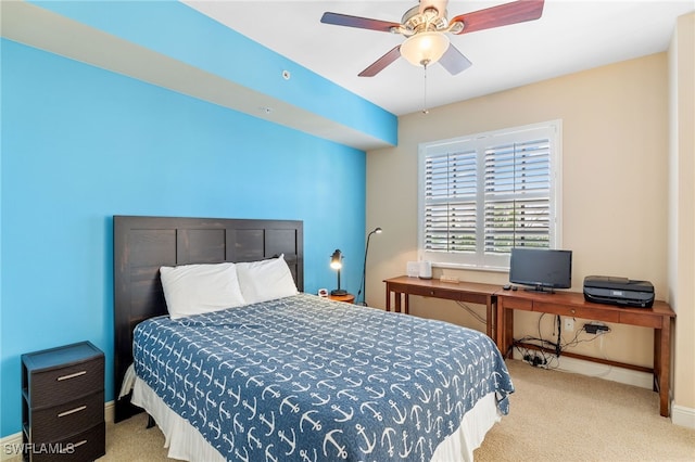 5781 Cape Harbour Dr Unit 610, Cape Coral, FL 33914 - bedroom with baseboards, a ceiling fan, and carpet floors