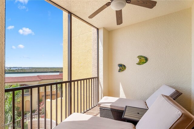 5781 Cape Harbour Dr Unit 610, Cape Coral, FL 33914 - balcony with ceiling fan and a water view