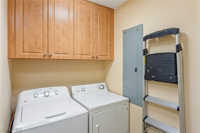 5781 Cape Harbour Dr Unit 610, Cape Coral, FL 33914 - laundry area featuring washing machine and clothes dryer, cabinet space, and electric panel