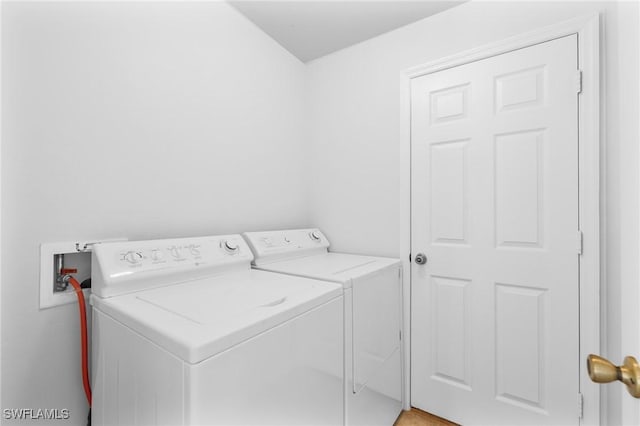 1401 NW 16th Pl, Cape Coral, FL 33993 - laundry room with washing machine and clothes dryer