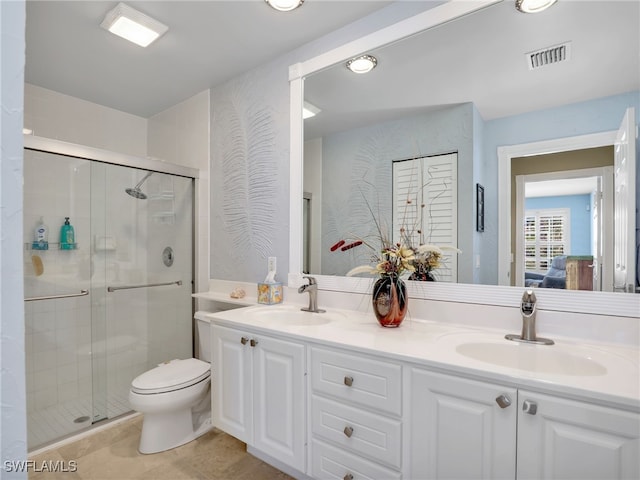 28902 Vermillion Ln, Bonita Springs, FL 34135 - bathroom featuring double vanity, a shower stall, connected bathroom, toilet, and tile patterned floors