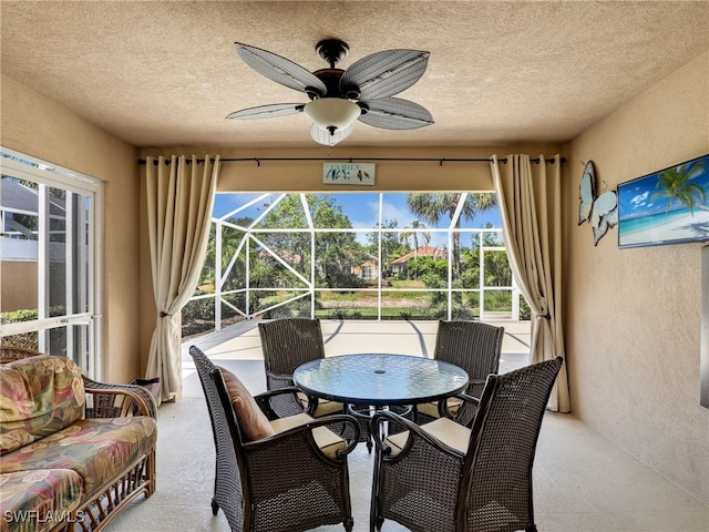 28902 Vermillion Ln, Bonita Springs, FL 34135 - sunroom featuring a ceiling fan, plenty of natural light, and outdoor dining area