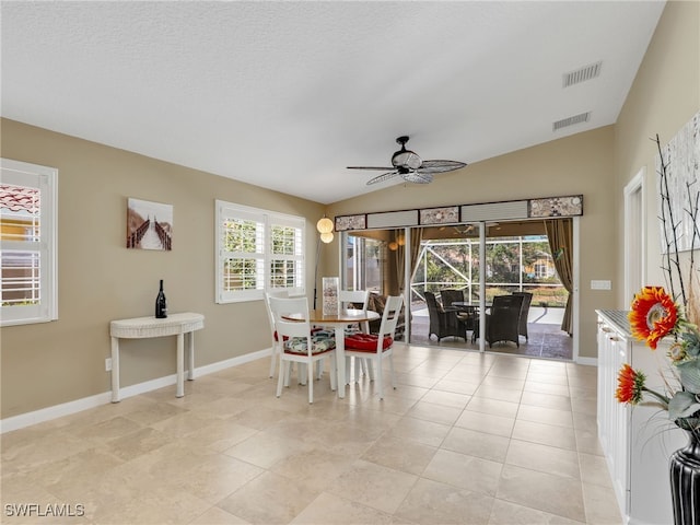 28902 Vermillion Ln, Bonita Springs, FL 34135 - dining room with ceiling fan, lofted ceiling, baseboards, and light tile patterned floors