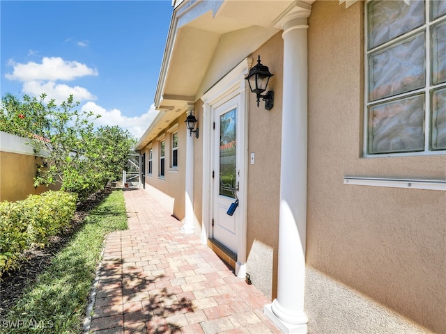 28902 Vermillion Ln, Bonita Springs, FL 34135 - entrance to property with stucco siding