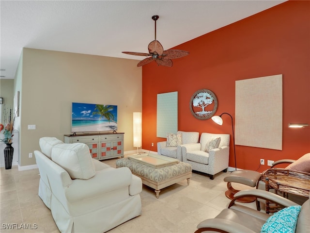 28902 Vermillion Ln, Bonita Springs, FL 34135 - living area with high vaulted ceiling, ceiling fan, baseboards, and tile patterned floors
