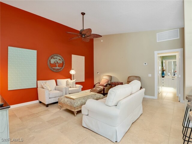 28902 Vermillion Ln, Bonita Springs, FL 34135 - living area featuring ceiling fan, baseboards, high vaulted ceiling, and light tile patterned flooring