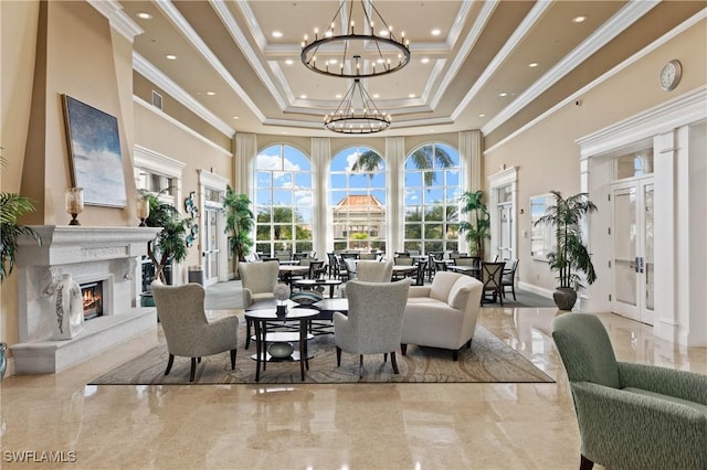 28902 Vermillion Ln, Bonita Springs, FL 34135 - building lobby featuring a towering ceiling, ornamental molding, and recessed lighting