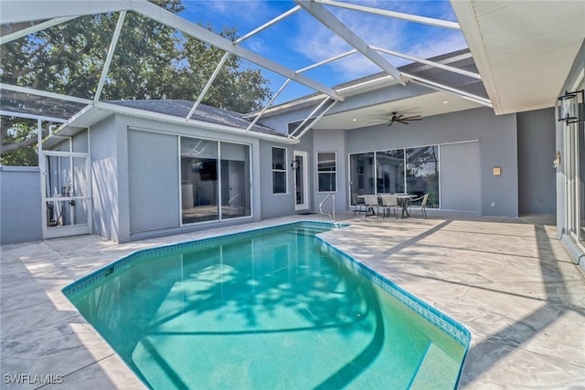 14831 Blackbird Ln, Fort Myers, FL 33919 - swimming pool featuring a patio, ceiling fan, and a lanai
