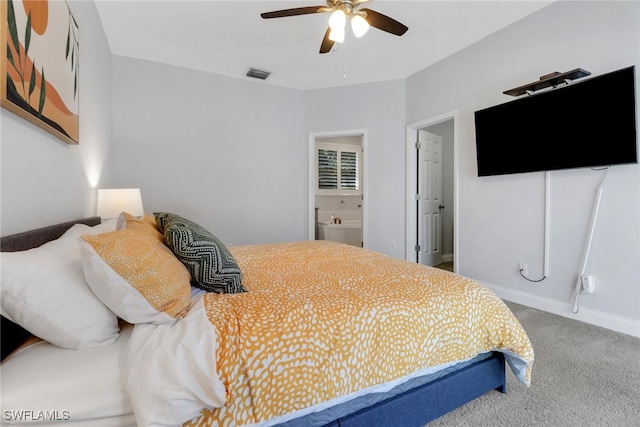 14831 Blackbird Ln, Fort Myers, FL 33919 - bedroom featuring carpet flooring, a ceiling fan, baseboards, and ensuite bath