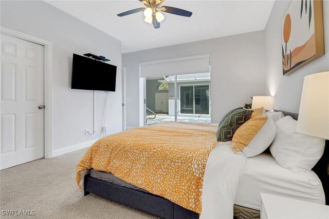 14831 Blackbird Ln, Fort Myers, FL 33919 - carpeted bedroom featuring ceiling fan, baseboards, and access to exterior