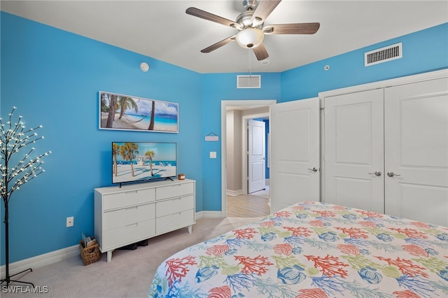 3414 Hancock Bridge Pkwy Unit 502, North Fort Myers, FL 33903 - carpeted bedroom featuring baseboards, a ceiling fan, and a closet