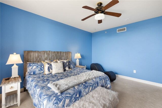 3414 Hancock Bridge Pkwy Unit 502, North Fort Myers, FL 33903 - bedroom featuring carpet, baseboards, and a ceiling fan