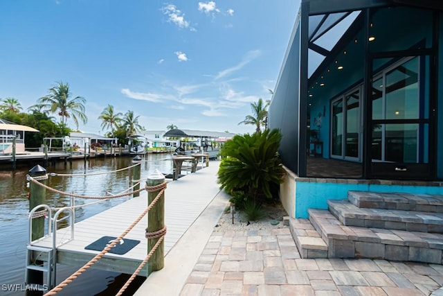 dock area featuring a water view