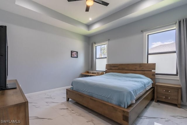 2625 27th Ave NE, Naples, FL 34120 - bedroom featuring light marble finish flooring, baseboards, a raised ceiling, a ceiling fan, and recessed lighting