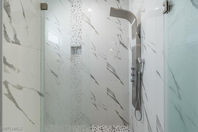2625 27th Ave NE, Naples, FL 34120 - bathroom featuring a marble finish shower