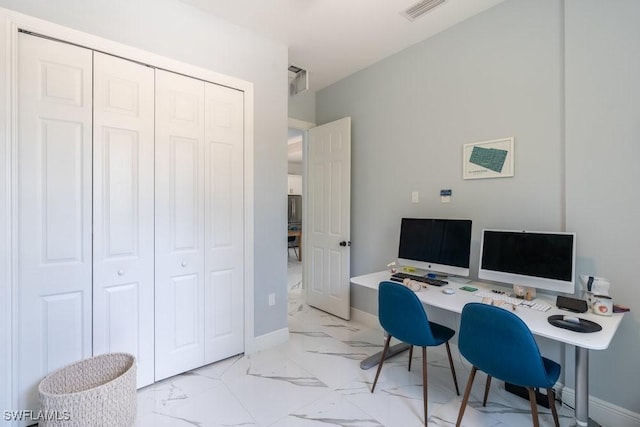 2625 27th Ave NE, Naples, FL 34120 - home office featuring light marble finish floors and baseboards