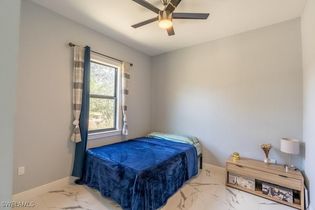 2625 27th Ave NE, Naples, FL 34120 - bedroom with marble finish flooring, baseboards, and a ceiling fan