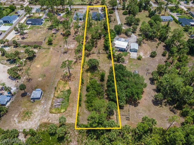 2625 27th Ave NE, Naples, FL 34120 - aerial view of residential area with property boundaries highlighted