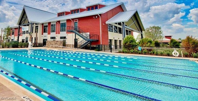 view of pool with fence