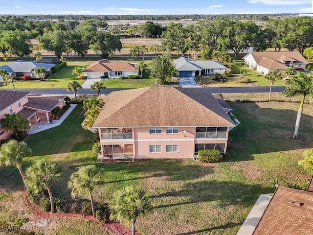 drone / aerial view with a residential view