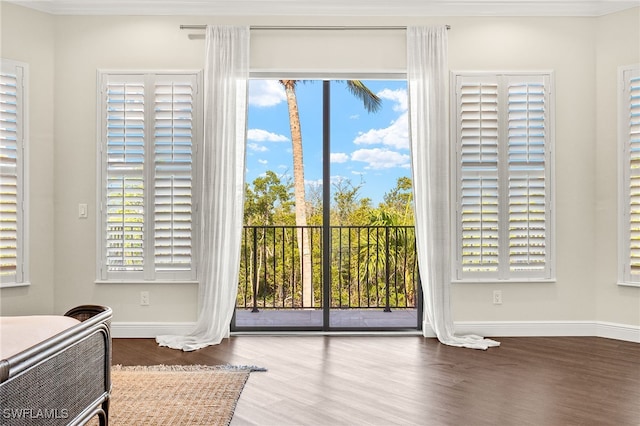 15460 Catalpa Cove Ln, Fort Myers, FL 33908 - bedroom with wood finished floors, access to exterior, and baseboards