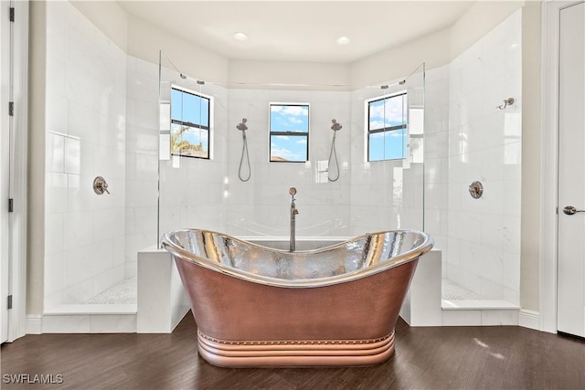 15460 Catalpa Cove Ln, Fort Myers, FL 33908 - bathroom with plenty of natural light, wood finished floors, and walk in shower