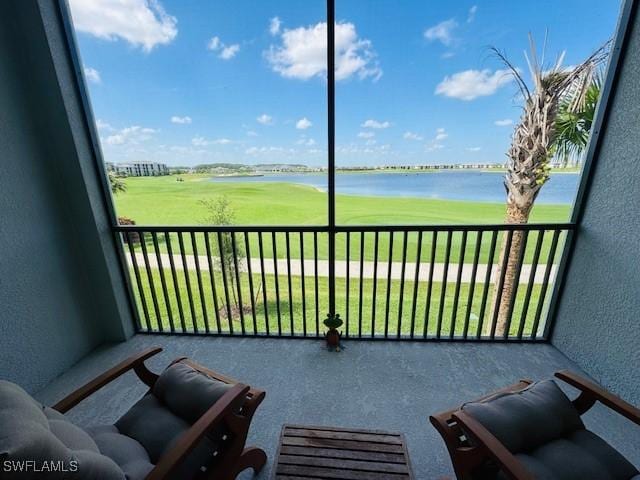 5629 Double Eagle Cir Unit 4224, Ave Maria, FL 34142 - balcony with view of golf course and a water view