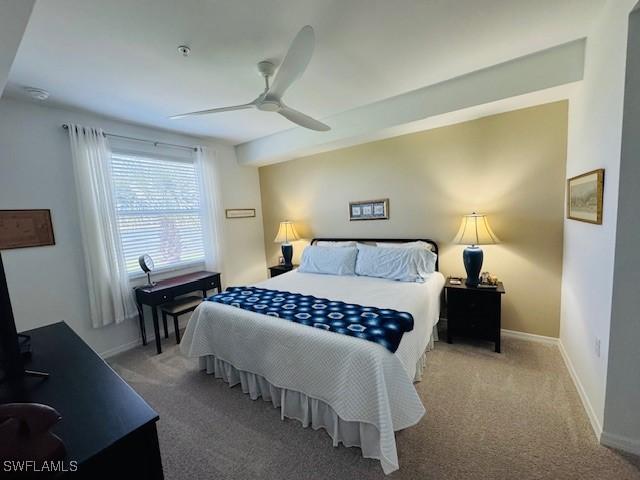 5629 Double Eagle Cir Unit 4224, Ave Maria, FL 34142 - carpeted bedroom with ceiling fan and baseboards