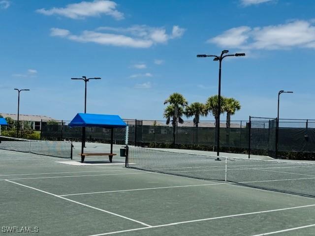 5629 Double Eagle Cir Unit 4224, Ave Maria, FL 34142 - view of sport court with fence