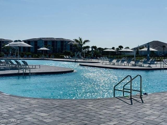 5629 Double Eagle Cir Unit 4224, Ave Maria, FL 34142 - pool featuring a patio area