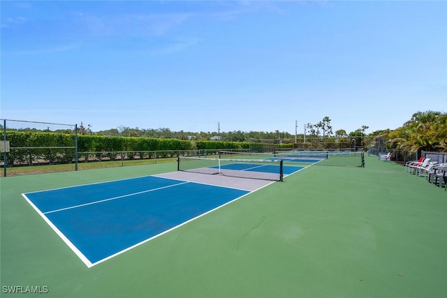 25804 Cockleshell Dr Unit 216, Bonita Springs, FL 34135 - view of tennis court with fence