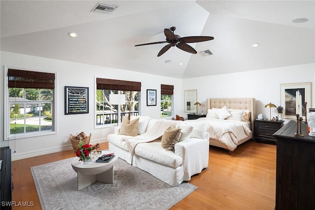 7996 Beaumont Ct, Naples, FL 34109 - bedroom with lofted ceiling, baseboards, light wood-style flooring, and visible vents