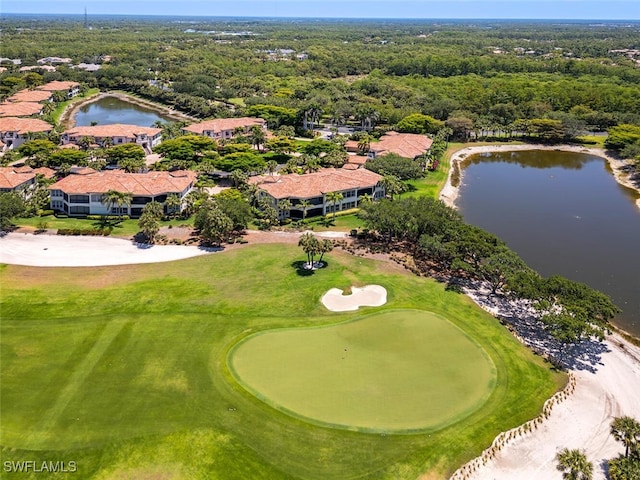 bird's eye view featuring a water view and golf course view