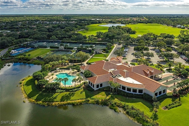 drone / aerial view featuring a water view and view of golf course