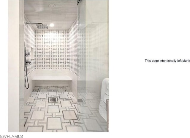 16995 Porta Vecchio Way Unit 202, Naples, FL 34110 - full bathroom with a tile shower