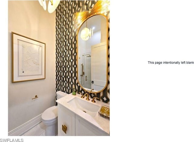 16995 Porta Vecchio Way Unit 202, Naples, FL 34110 - bathroom with vanity, toilet, baseboards, and a shower