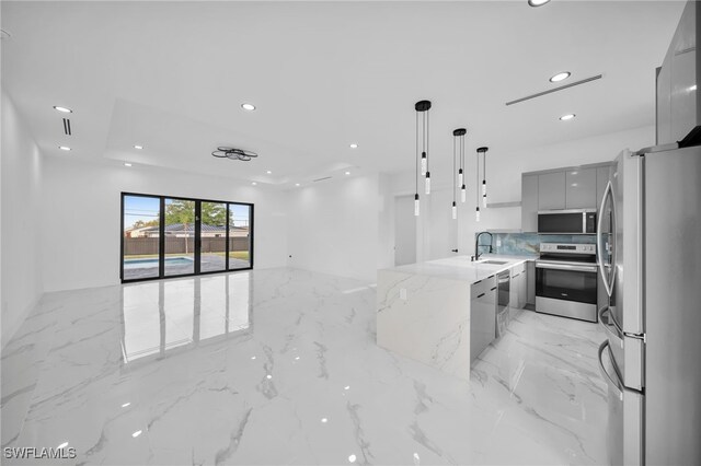 4026 SE 3rd Ave, Cape Coral, FL 33904 - kitchen featuring modern cabinets, recessed lighting, gray cabinets, a sink, and stainless steel appliances
