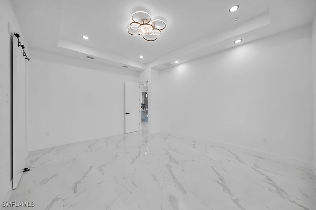 4026 SE 3rd Ave, Cape Coral, FL 33904 - unfurnished room with recessed lighting, a tray ceiling, baseboards, and marble finish floor